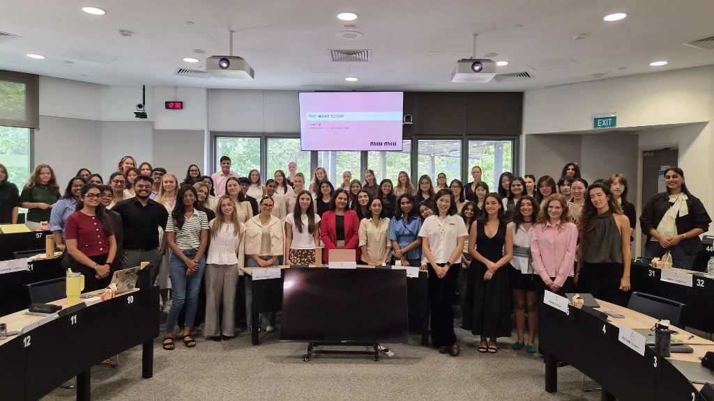 Lynn Chou, Managing Director of Miu Miu Singapore, with students at ESSEC Business School Singapore